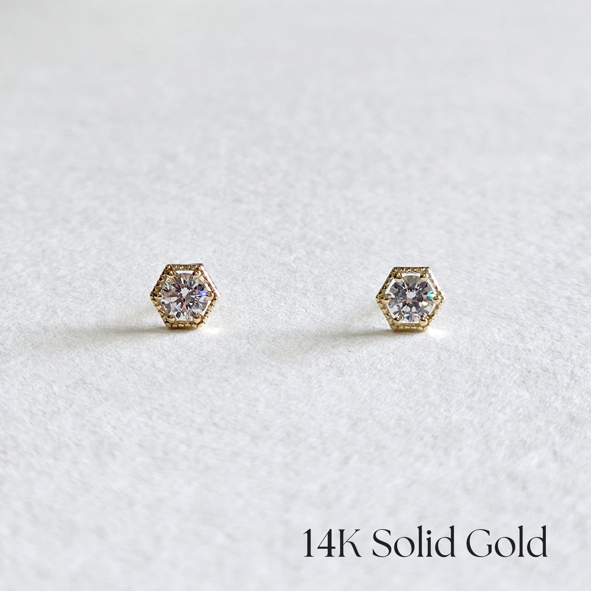Front view of 14K Crystal Hexagon earrings with CZ center
