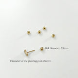 Multiple 14K gold screwball backs and one compatible piercing post displayed on white background with size annotations