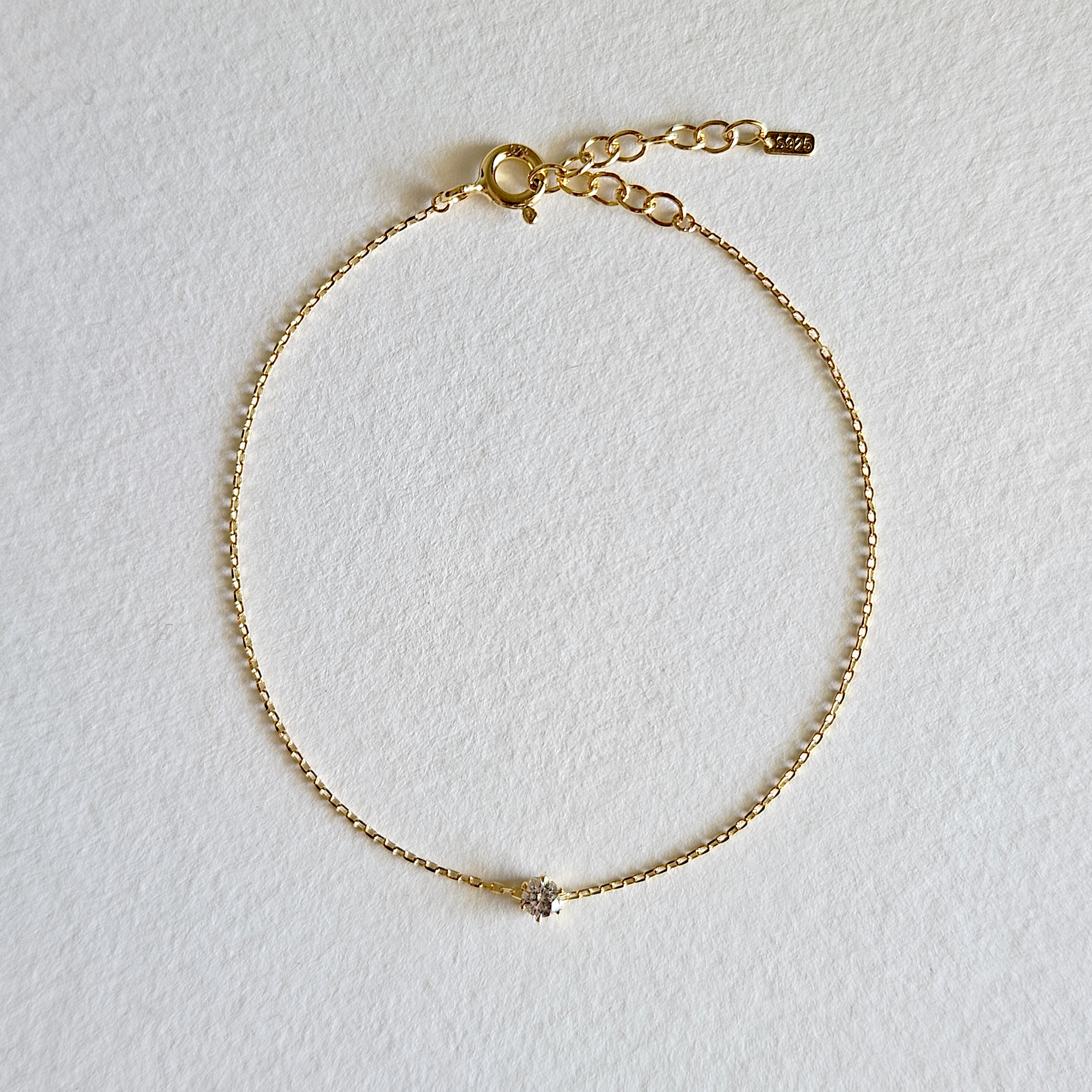 Elegant crystal bracelet featuring a dainty chain with 3mm cubic zirconia stone accents, perfect for sophisticated style