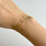 Elegant crystal bracelet featuring a dainty chain with 3mm cubic zirconia stone accents, perfect for sophisticated style