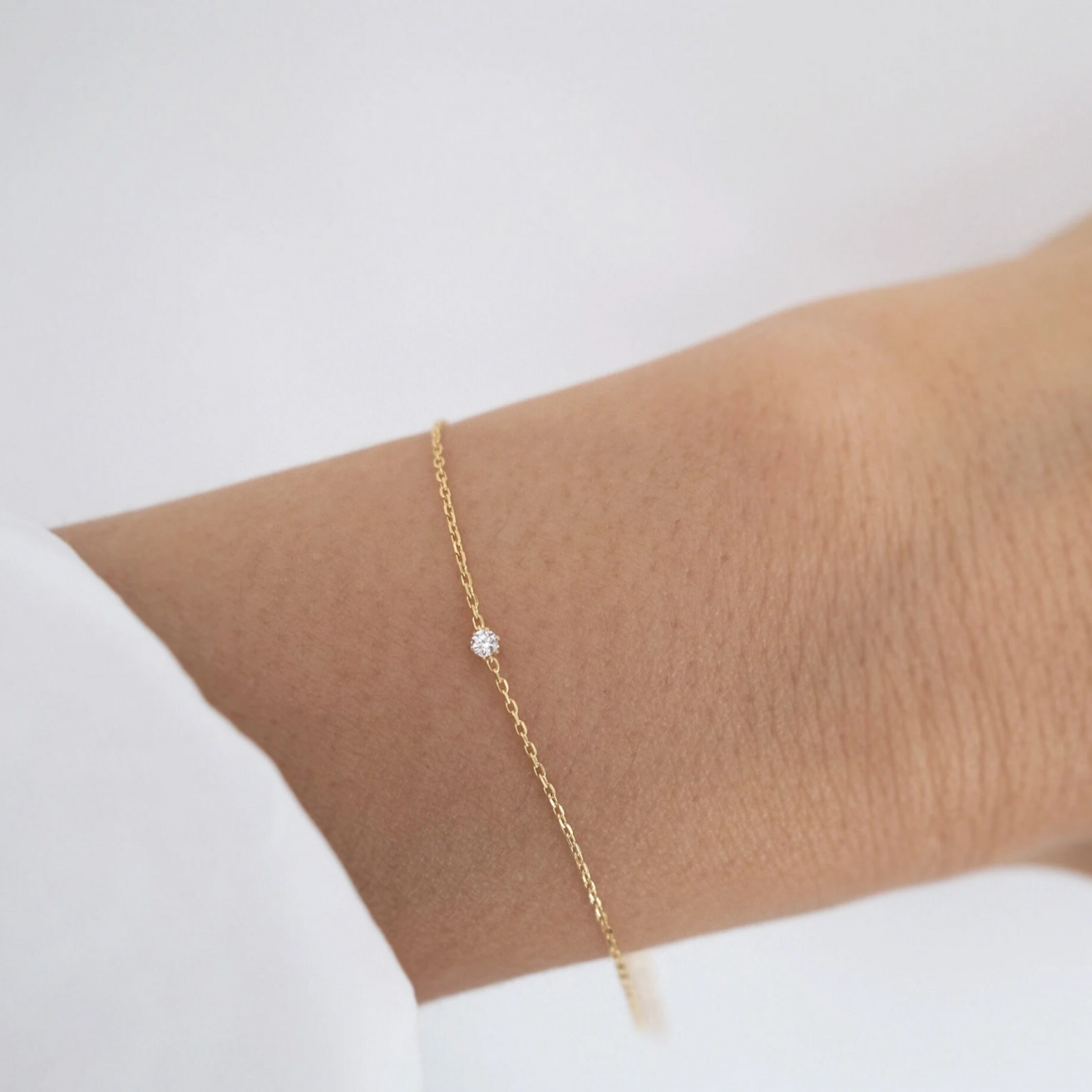 Petite crystal bracelet with minimal design featuring a delicate stone for elegant, understated style