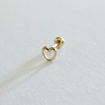 Sleek gold heart stud shown from the side with gentle shine