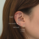 Angela Cartilage Earring layered with small cartilages for a curated ear look