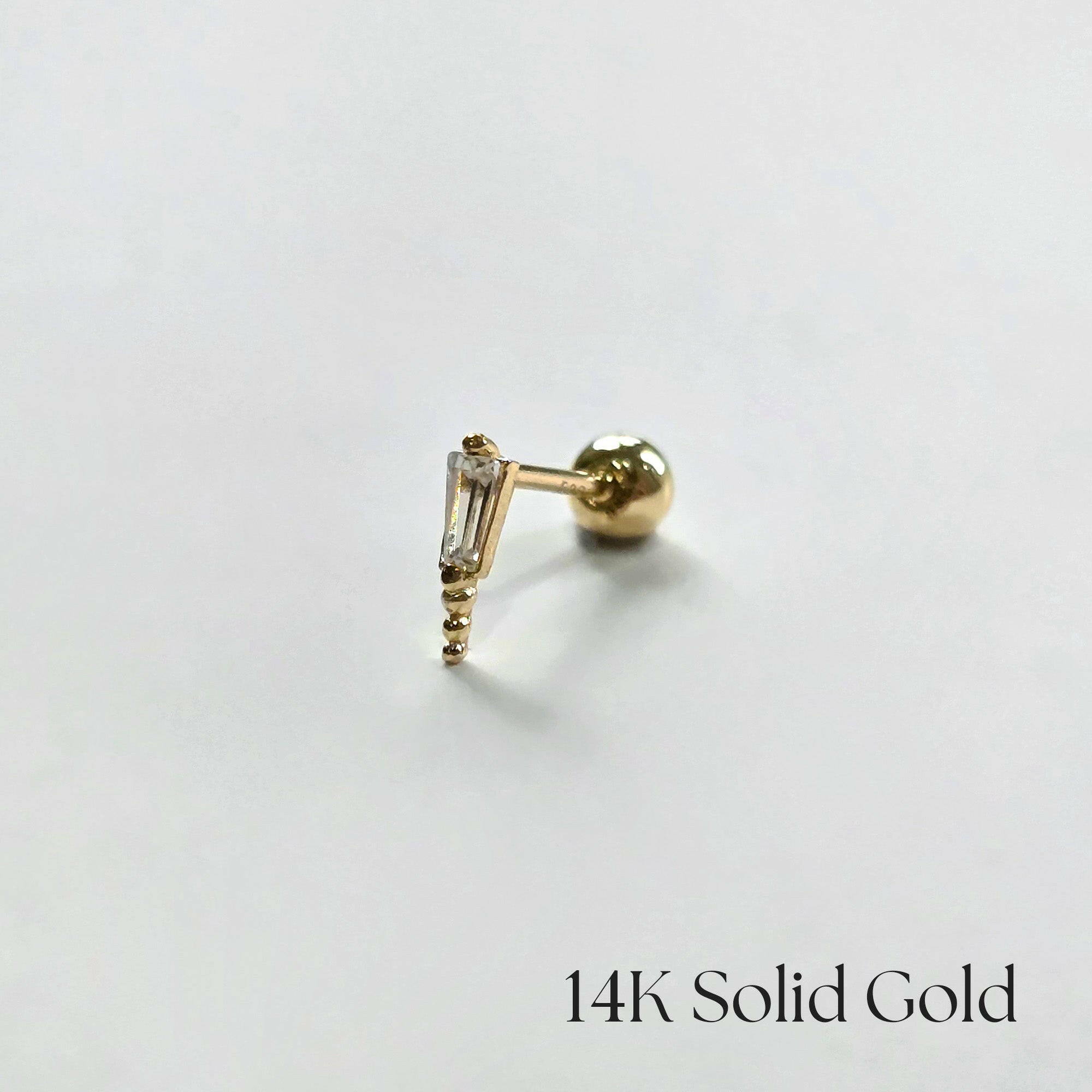 Close-up side view of the Angela Cartilage Earring, showing vertical crystal bar detail