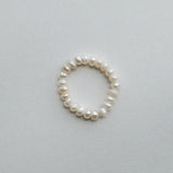 Elegant freshwater pearl beaded stretchy ring showcasing delicate craftsmanship in a stylish beaded design