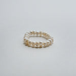 Elegant freshwater pearl beaded stretchy ring showcasing delicate craftsmanship in a stylish beaded design