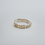 Elegant freshwater pearl beaded stretchy ring showcasing delicate craftsmanship in a stylish beaded design