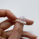 Elegant freshwater pearl beaded stretchy ring showcasing delicate craftsmanship in a stylish beaded design