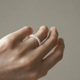 Elegant freshwater pearl beaded stretchy ring showcasing delicate craftsmanship in a stylish beaded design