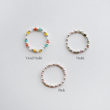 Elegant Bari beads ring with silver bead balls, colorful stones, stretchy design, and handmade craftsmanship