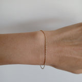 Close-up of twisted rope design bracelet styled solo on wrist