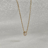 Macro shot of Bella Luce pendant featuring premium cubic zirconia in 14K gold