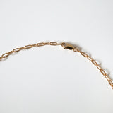 Side angle showing chain links and clasp durability