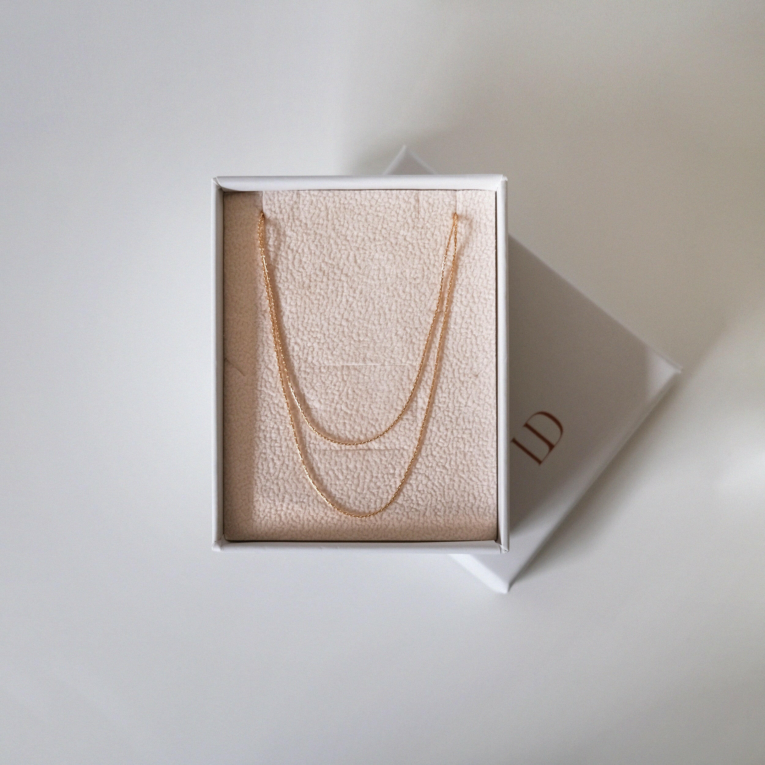Chain necklace displayed in a gift box