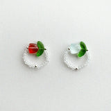 Handmade floral beaded ring featuring tulip flower centerpiece, and clear stones for elegant style