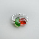 Handmade floral beaded ring featuring tulip flower centerpiece, and clear stones for elegant style