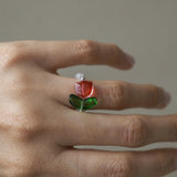 Handmade floral beaded ring featuring tulip flower centerpiece, and clear stones for elegant style