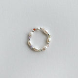 Colour stone pearl ring featuring an oval shaped freshwater pearl with colourful stone between, elegant and exquisite jewelry design