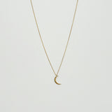 14K Solid Gold Crescent Luna Necklace featuring a delicate moon pendant on sparkling chain