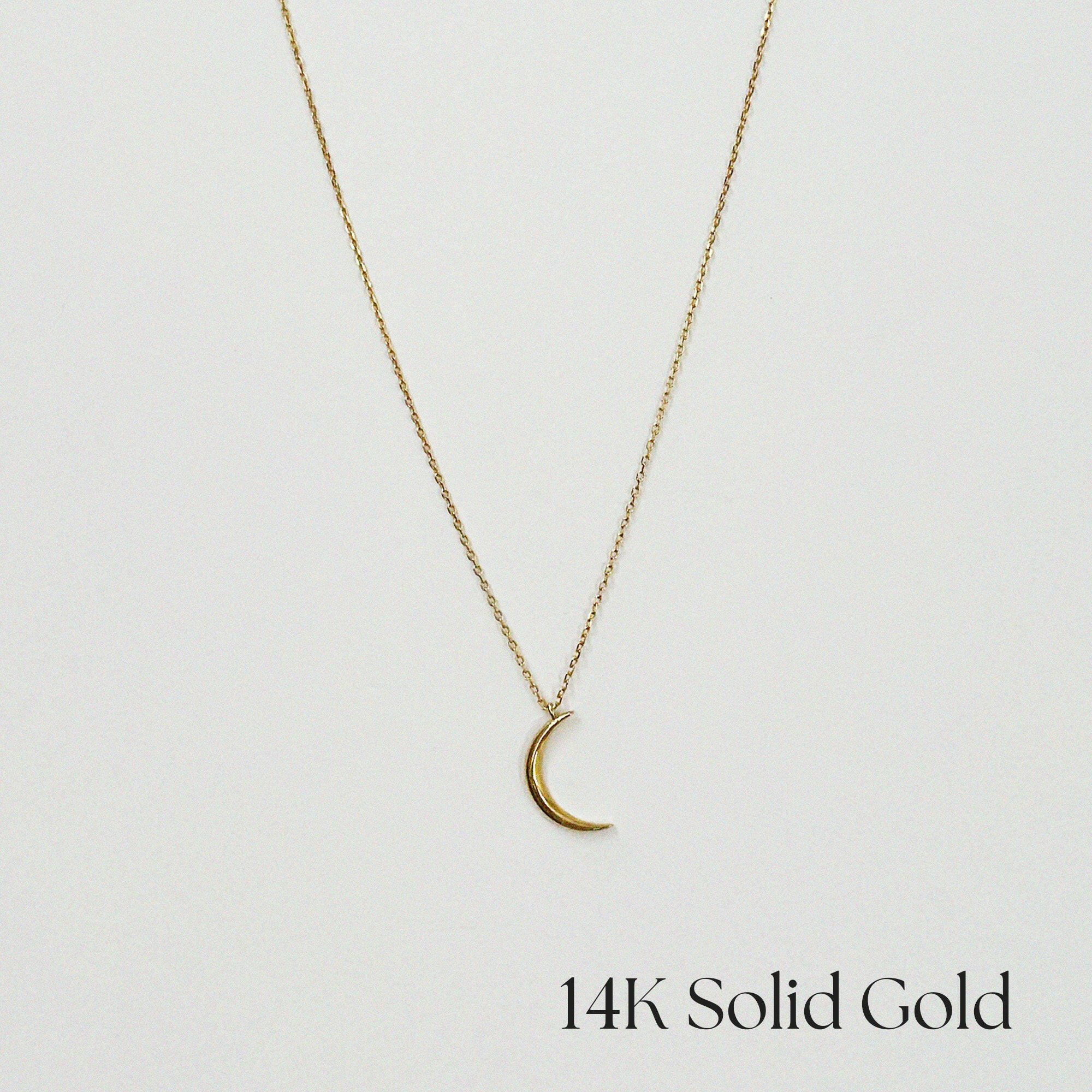 14K Solid Gold Crescent Luna Necklace featuring a delicate moon pendant on sparkling chain