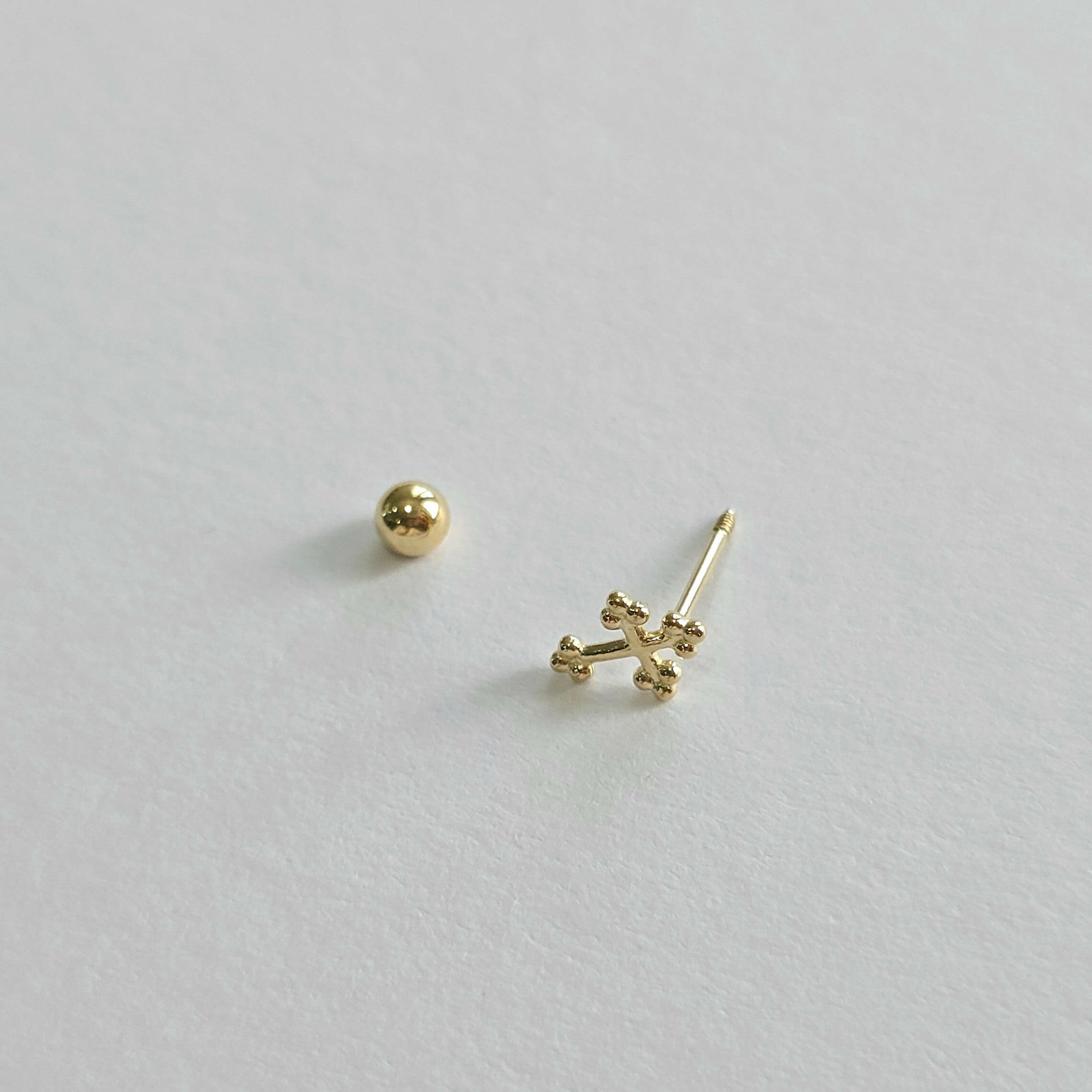 14K Croce Cartilage Earring.