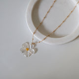 Ultra close-up of mother of pearl daisy texture and shine