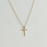 Overhead shot showing radiant sparkle from diamond-encrusted cross