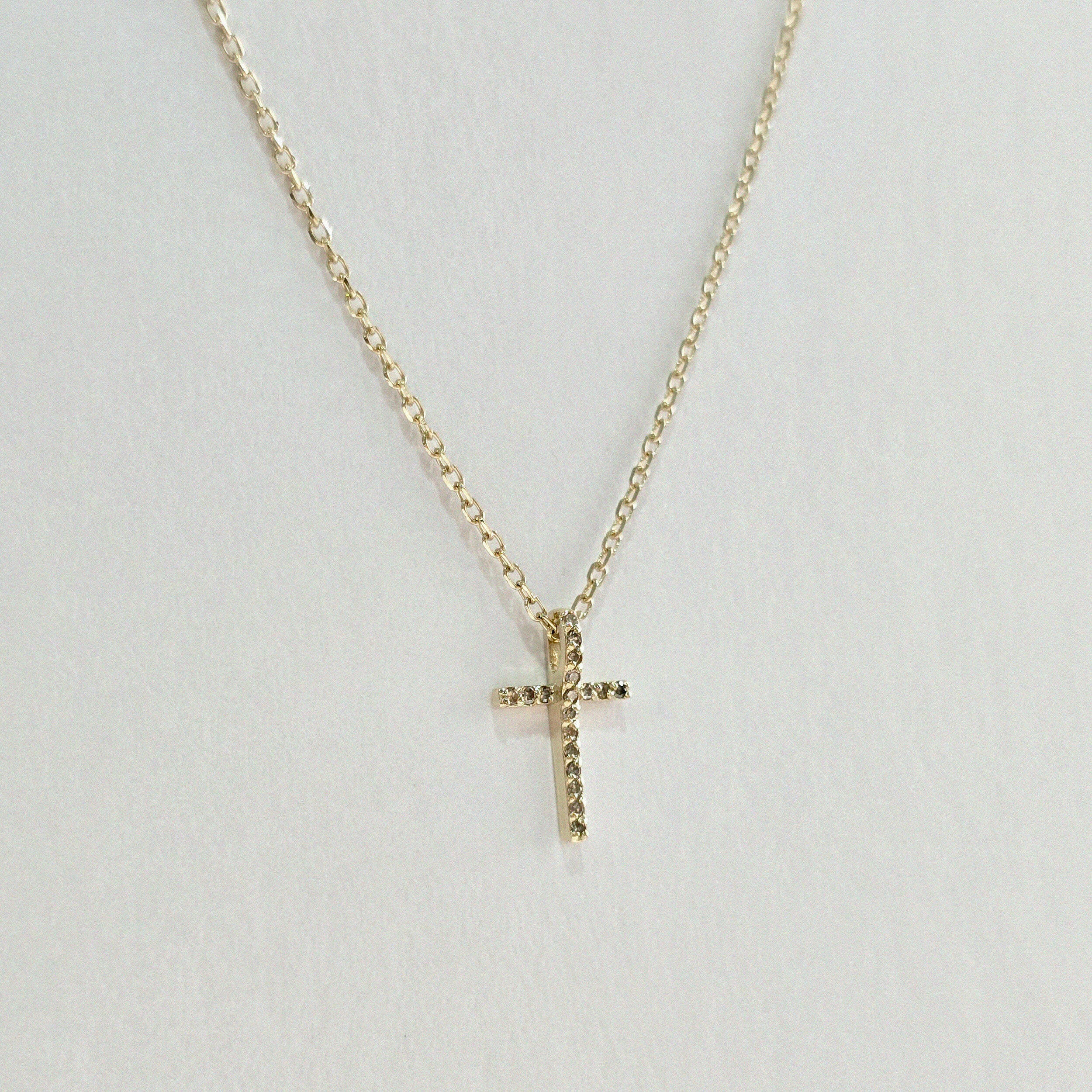 Overhead shot showing radiant sparkle from diamond-encrusted cross