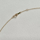 Back clasp and extender chain in polished 14K yellow gold