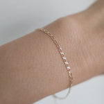 Elegant oval link gold bracelet styled in everyday wear