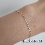 Model wearing the Elba Chain Bracelet solo on wrist for a minimal look