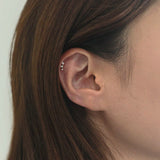 Minimalist styling of the Ella earring worn alone on the upper ear