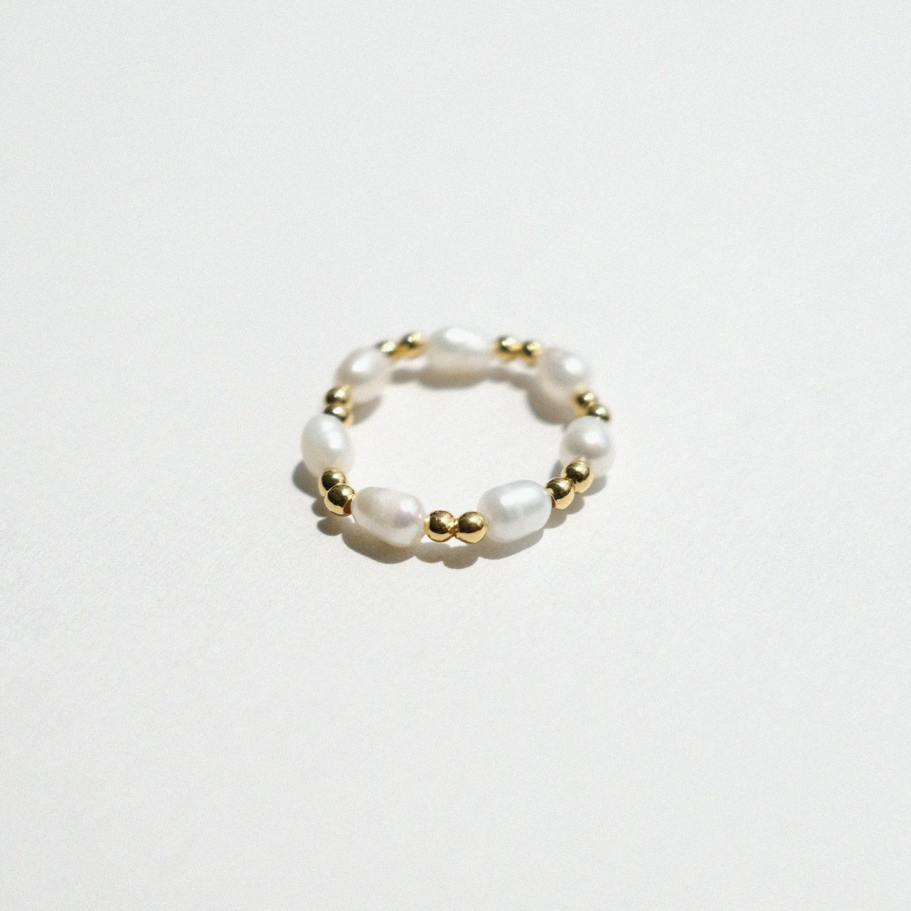 Evia Perla Ring featuring pearl style with sleek beads ball, and pearl alternating ring design