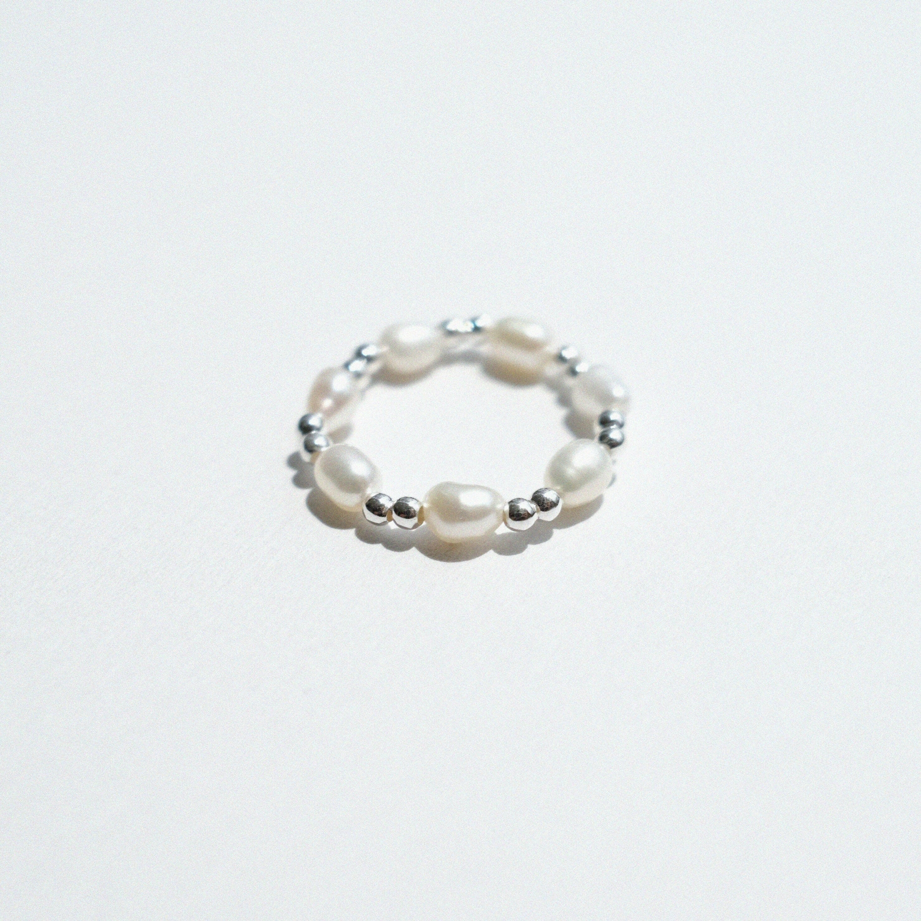 Evia Perla Ring featuring pearl style with sleek beads ball, and pearl alternating ring design