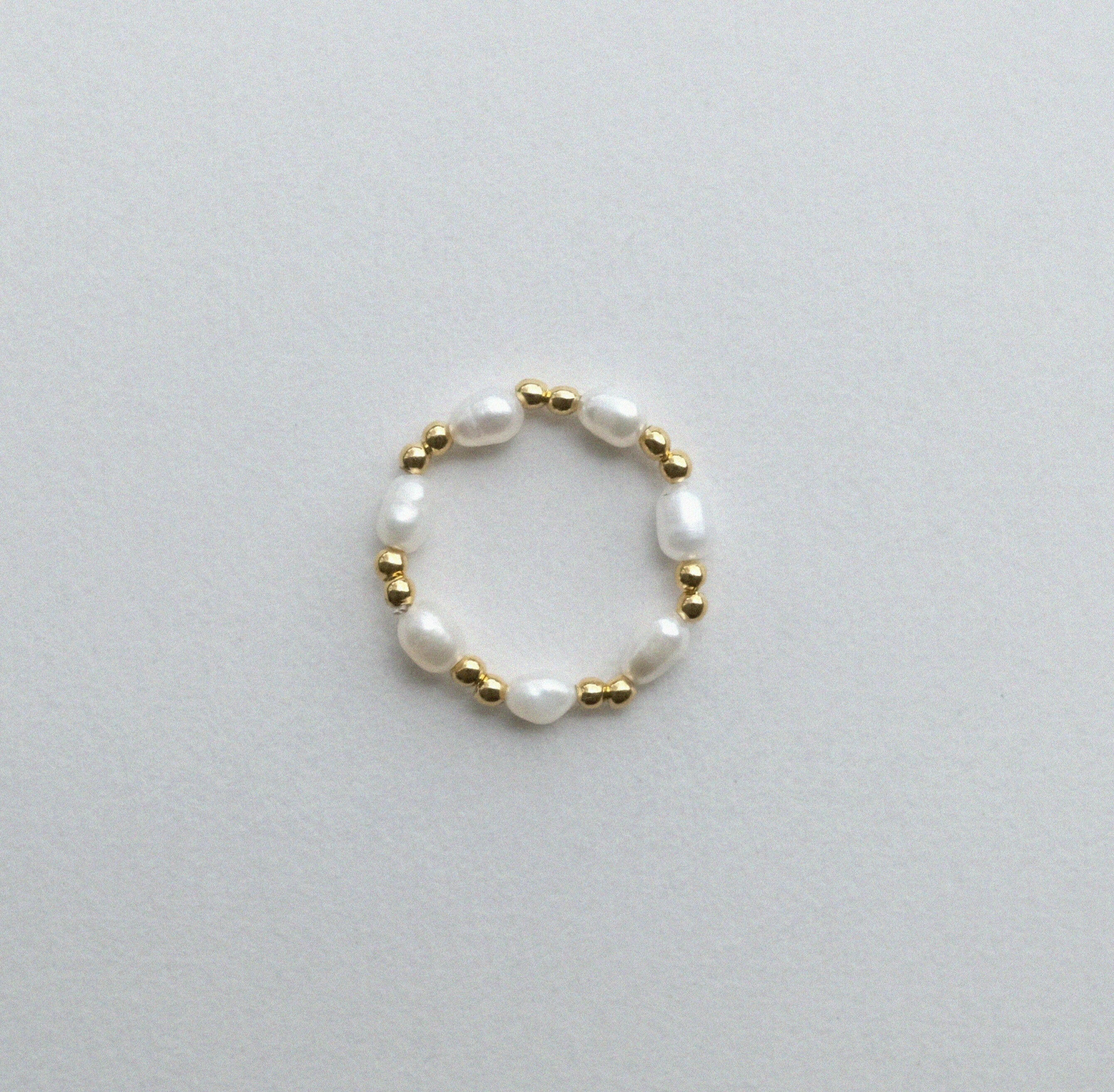 Evia Perla Ring featuring pearl style with sleek beads ball, and pearl alternating ring design