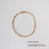 Flat lay of Gold Filled 45243 Link Chain Bracelet showcasing elongated oval links