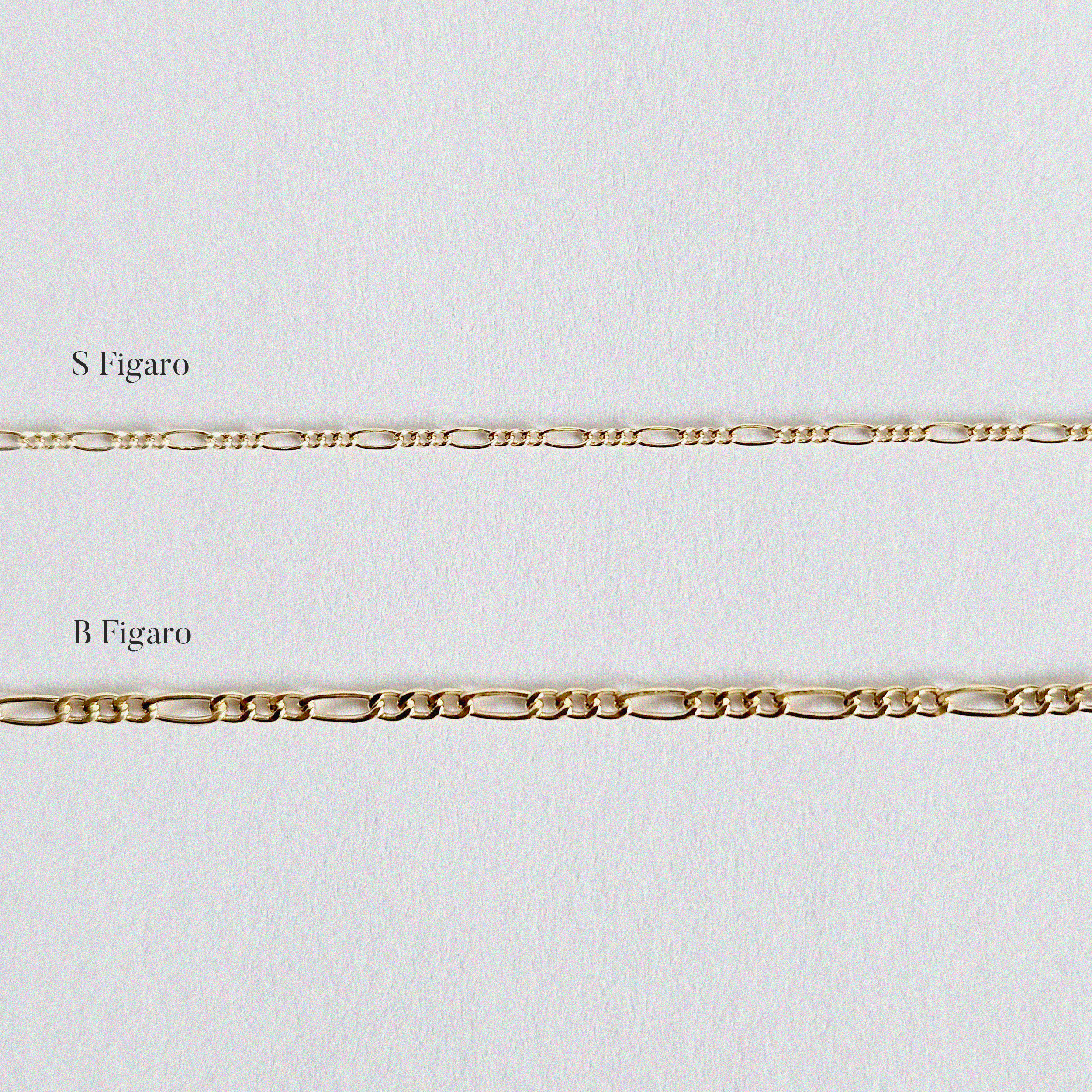 Gold Filled B Figaro Bracelet and S Figaro chain displayed on white background