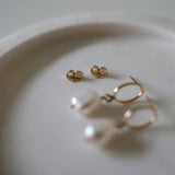 Close-up showing butterfly backs and earring post design of Celina Earrings