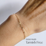 Model wearing Coffee Bean Bracelet with top view showcasing bold chain