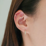 Crystal Huggies in mint colour styled alone by model, subtle and elegant daily look