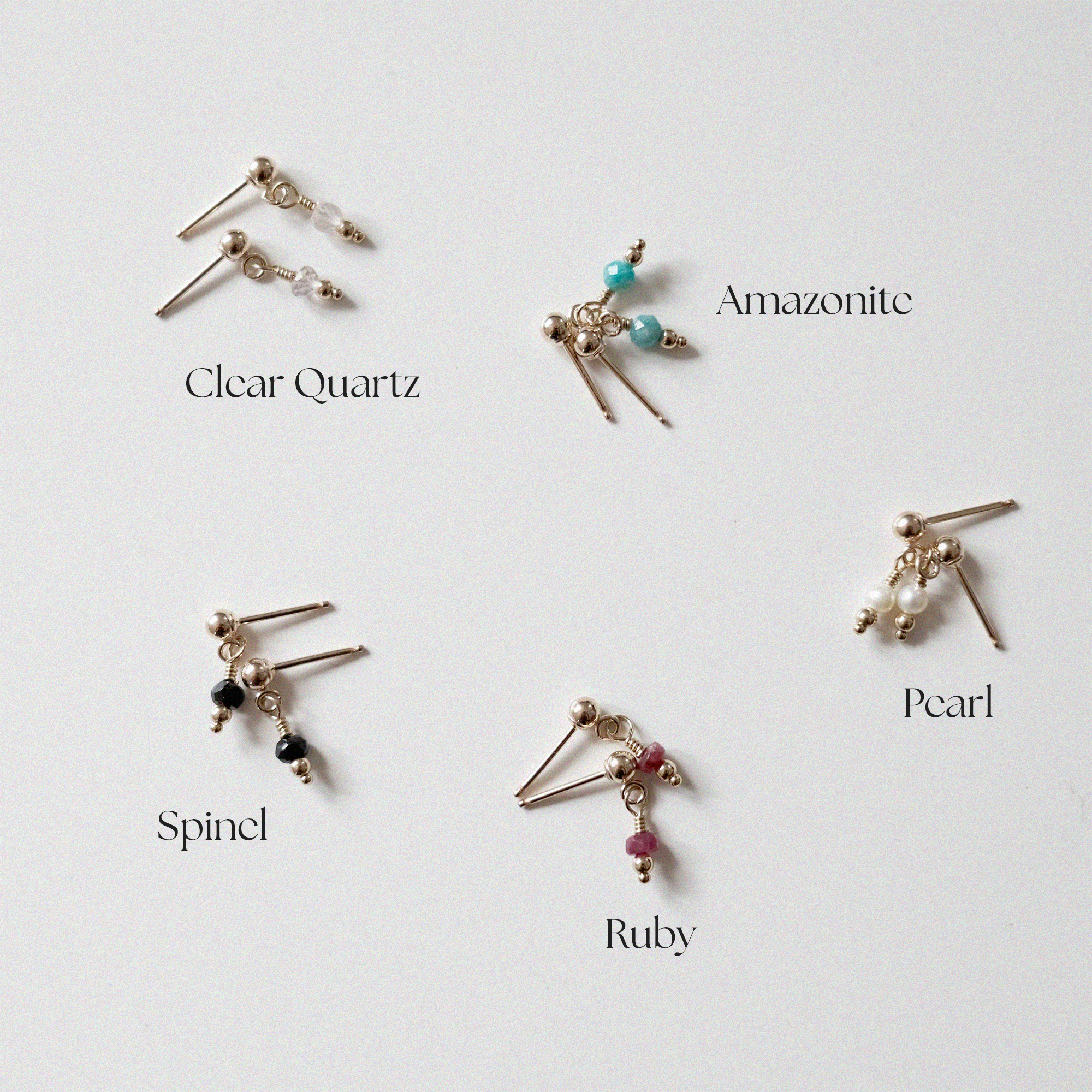Dainty and minimal handmade earrings featuring clear quartz, black spinel, freshwater pearl, amazonite, and ruby