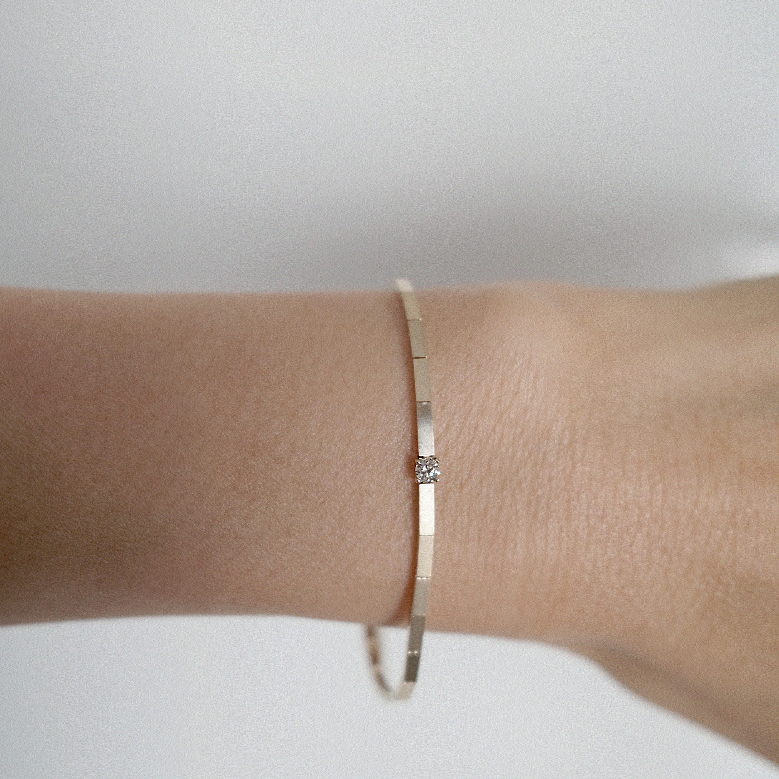 Simple yet luxurious diamond bracelet worn solo on wrist