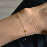 Model wearing the My Initial with Diamond Bracelet for a personalized, elegant wrist look