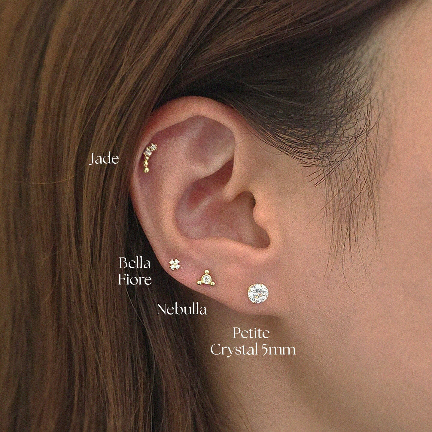 Styled ear stack with the Nebula Cartilage Earring paired with crystal cartilages