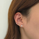 Multi-piercing look featuring Nebula as a delicate center point