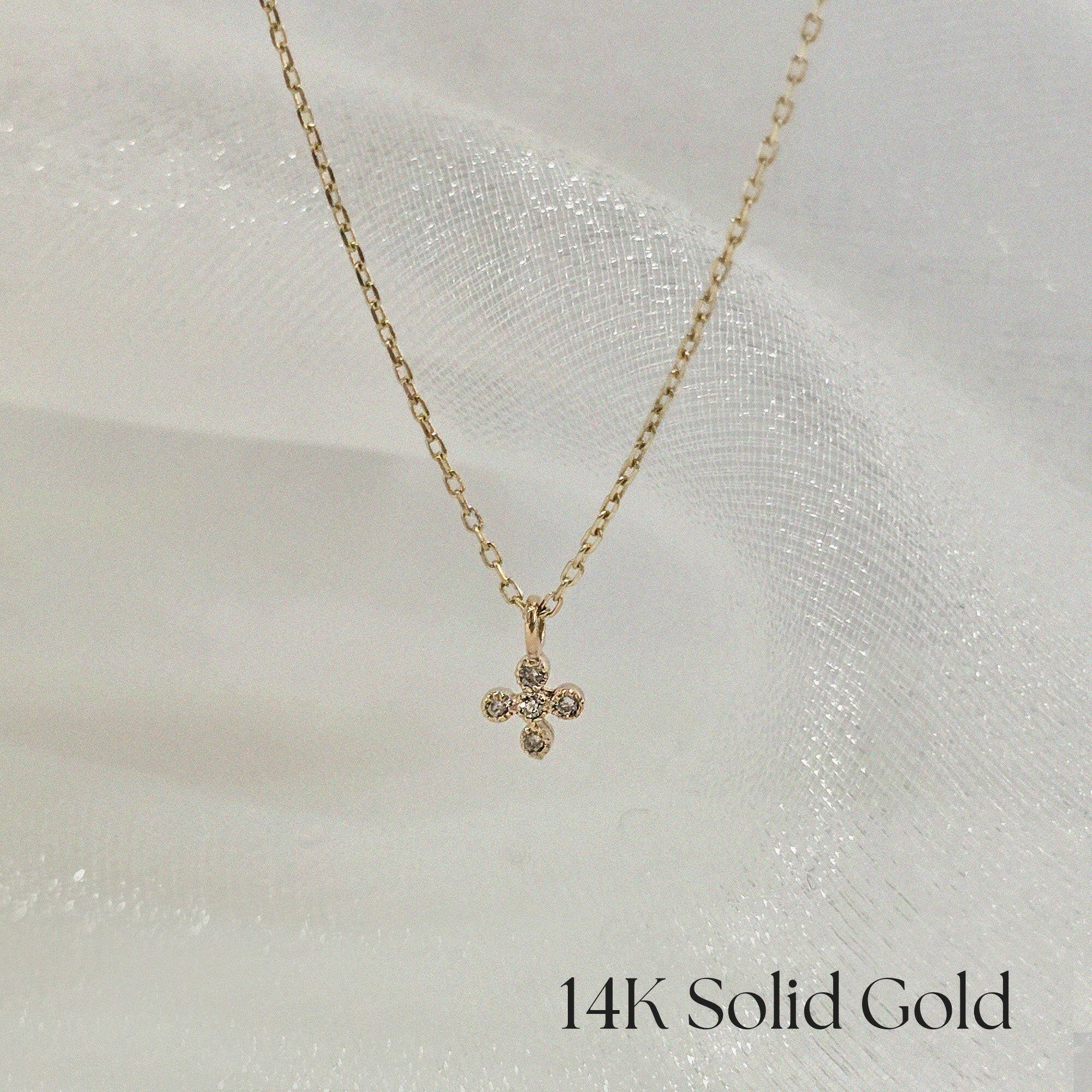 14K Solid Gold La Cross Diamond Necklace – Close-up of the diamond-set cross pendant, revealing the brilliance and gold texture.
