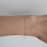 Delicate box chain bracelet worn daily for understated elegance