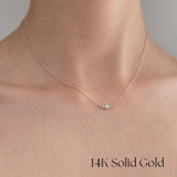 Model wearing the Luminex Diamond Necklace – pendant resting elegantly near collarbone