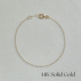 14K Lyon Chain Bracelet with petite gold links displayed flat on white background