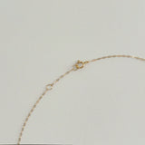 Close-up of diamond-cut curved chain on 14K solid gold Milano necklace – high polish finish